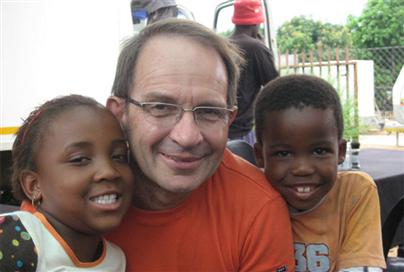 Allan Stratton (centre) Thato Kgaladi (Soly, the boy) and Mapaseka Matheba (Iris, the girl) on the set of film Life, Above All in South Africa.